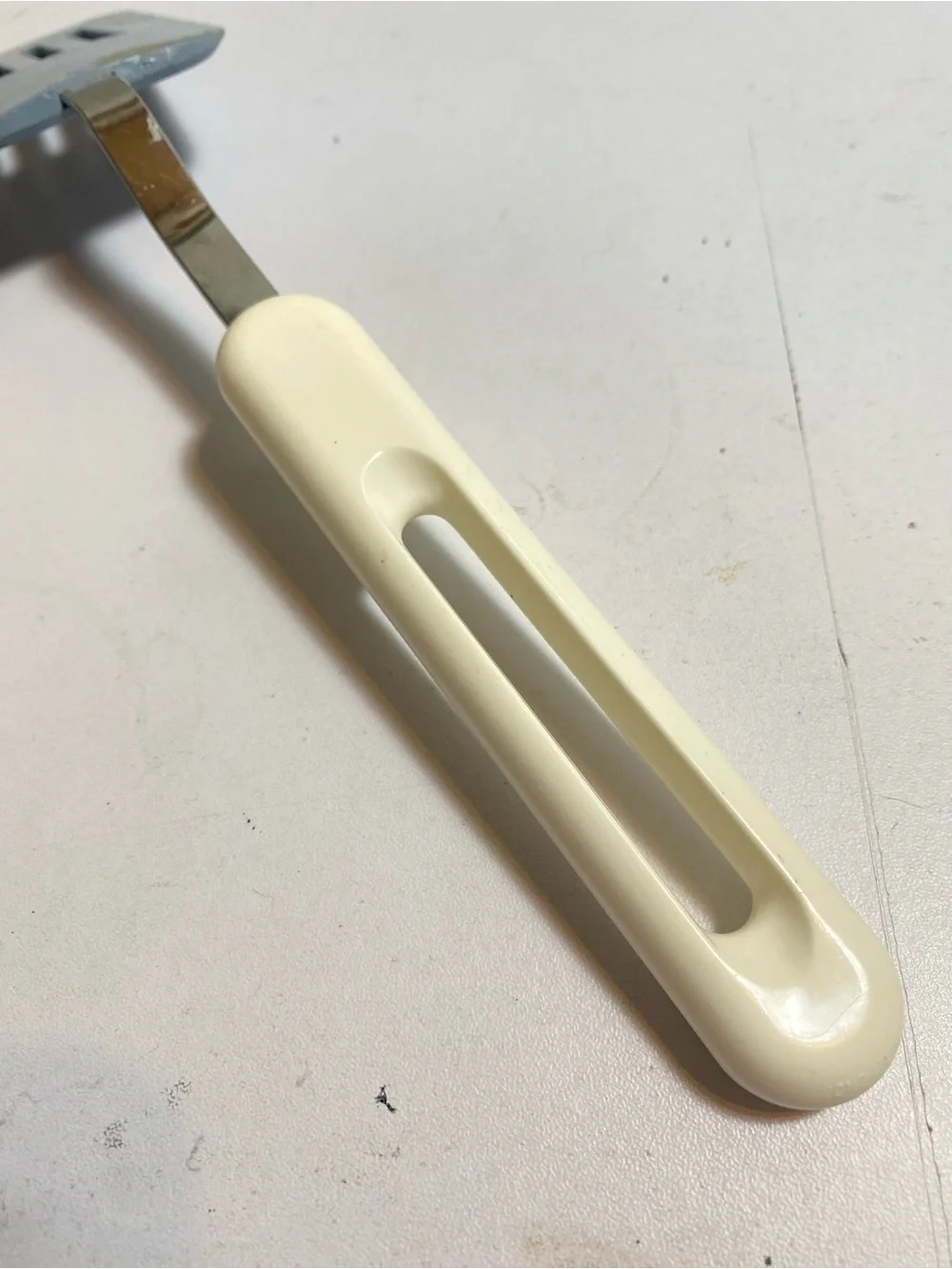 VTG Bonny USA Slotted Spatula Turner Blue Head White Plastic Handle Stainless